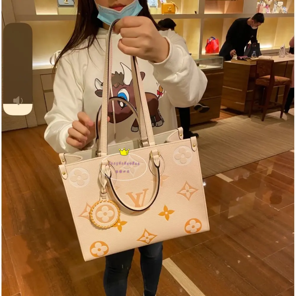 Túi Louis Vuitton OnTheGo MM Monogram Empreinte Leather M45717 - Ảnh 5